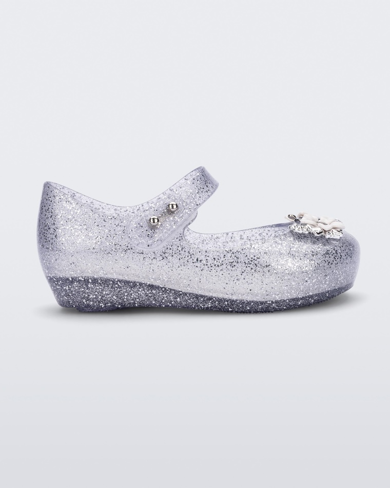 melissa_clear_mini_ultragirl_chrome_flower_baby.jpg Melissa Clear Mini Ultragirl Chrome Flower Baby - Image 1